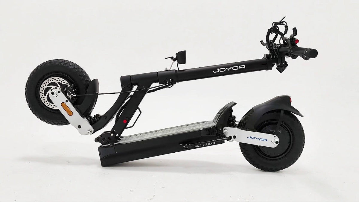 Side-by-side comparison of the JOYOR T12 single motor and JOYOR T12 Ultra dual motor off-road electric scooters.